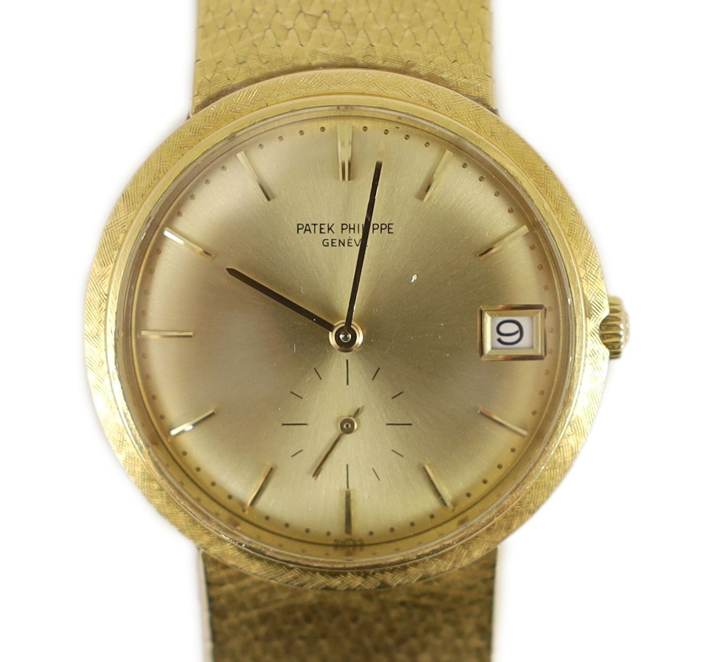 A gentleman's late 20th century 18ct gold Patek Philippe automatic dress wrist watch, on integral Patek Philippe 18ct gold bracelet